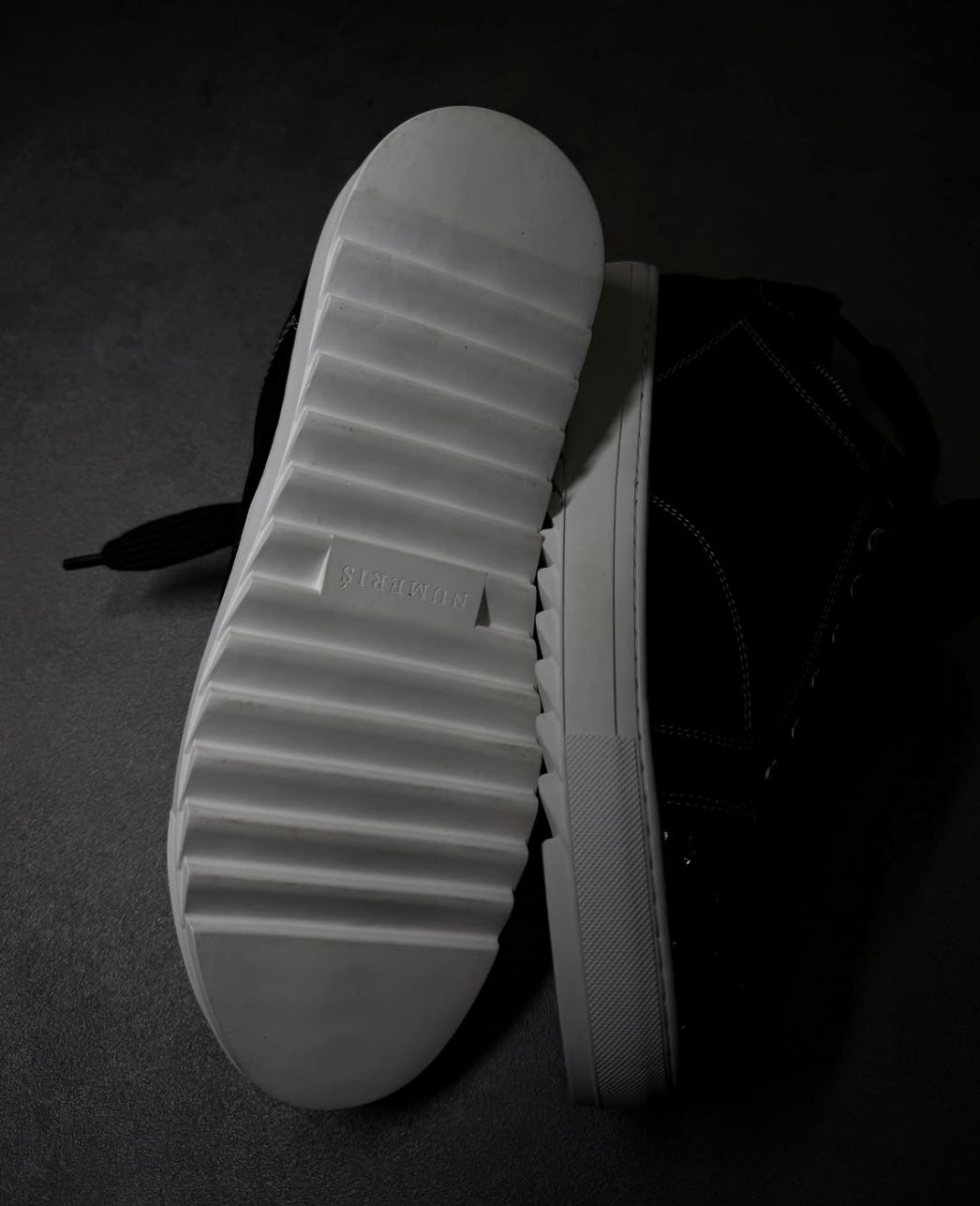 Numeris Atelier black sneakers.