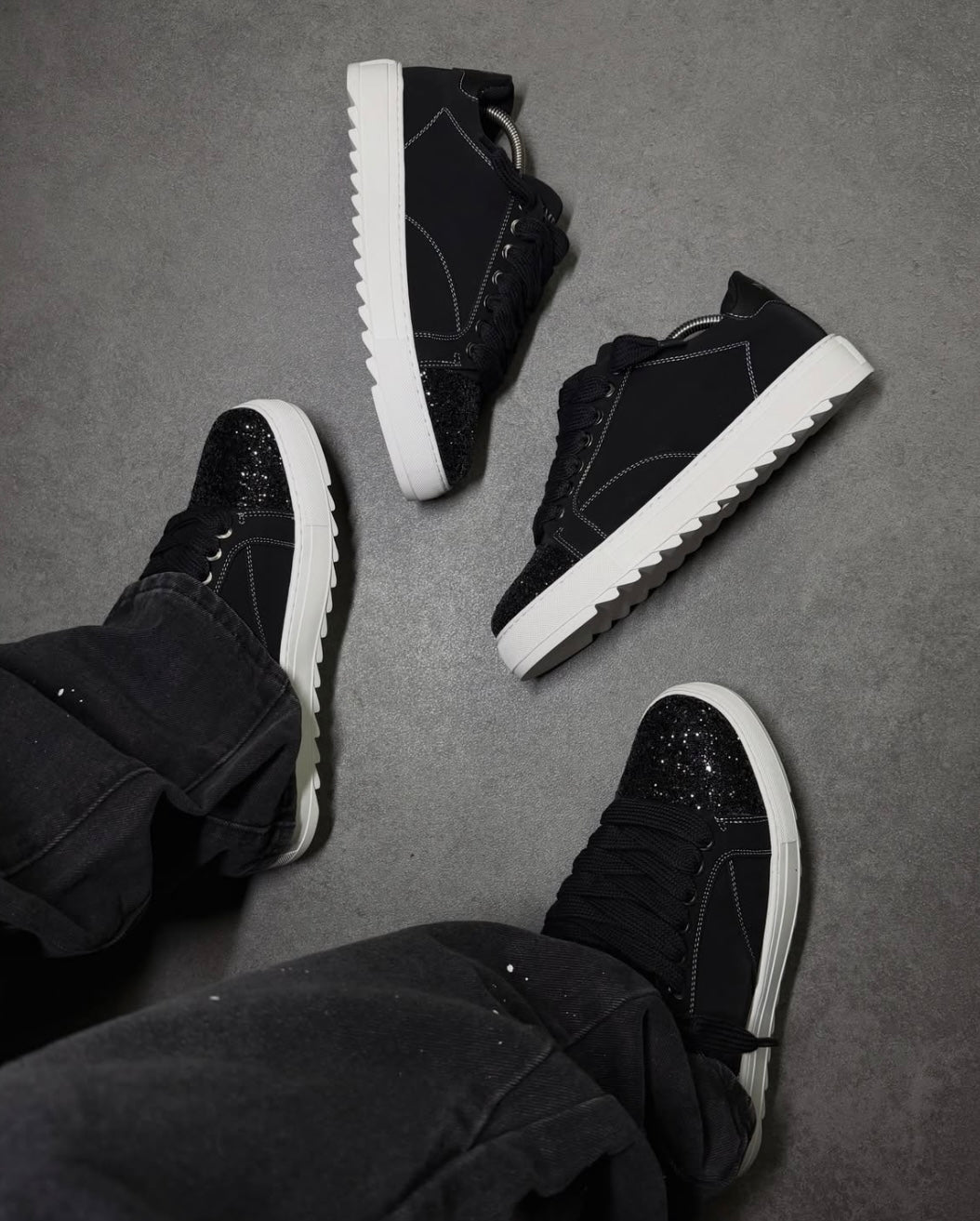 Numeris Atelier black sneakers.
