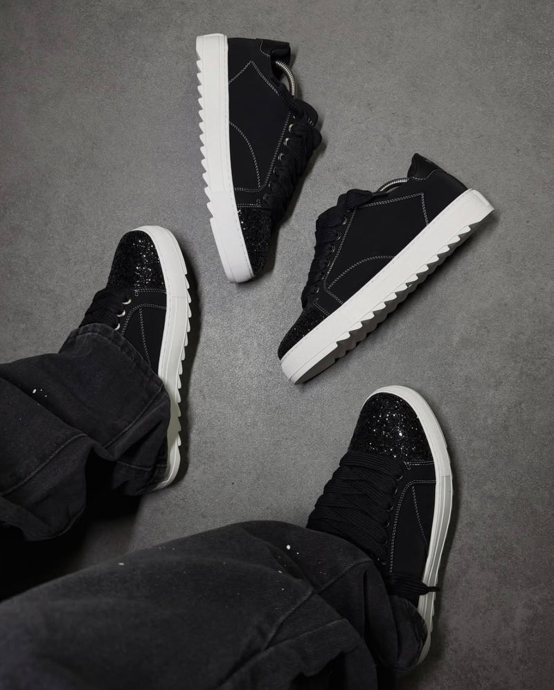 Numeris Atelier black sneakers.