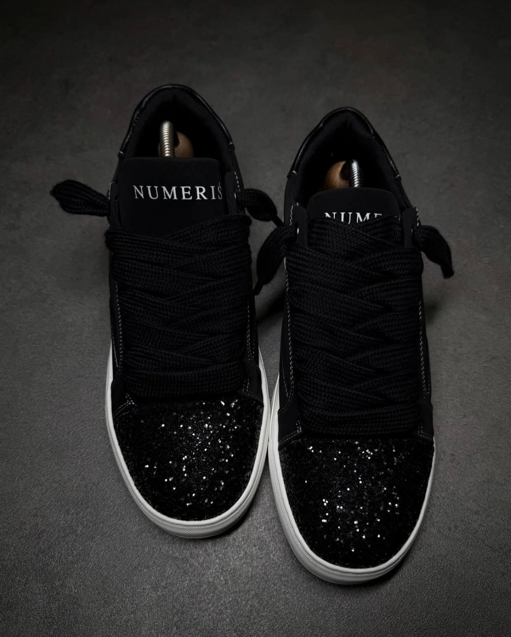 Numeris Atelier black sneakers.
