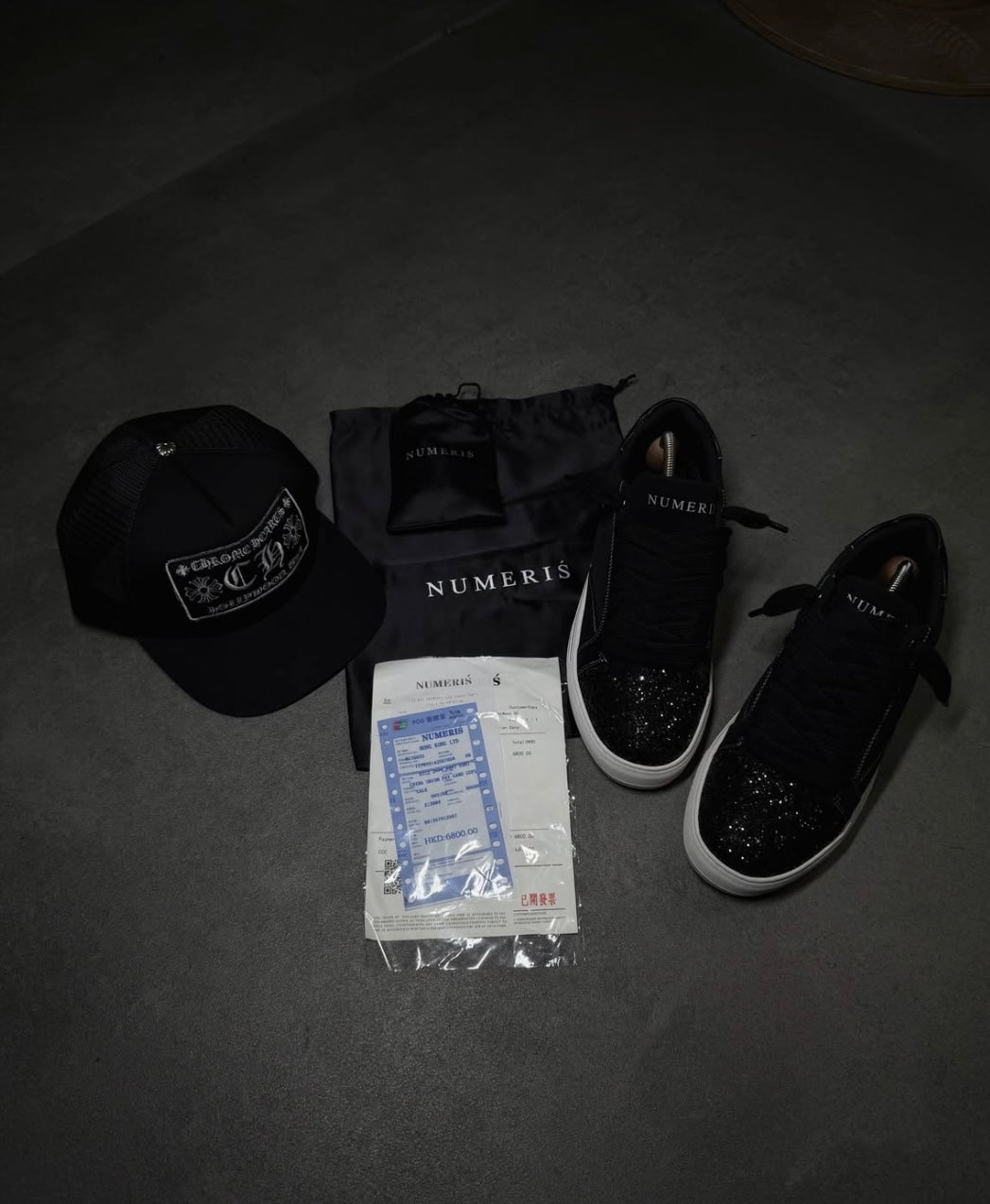 Numeris Atelier black sneakers.